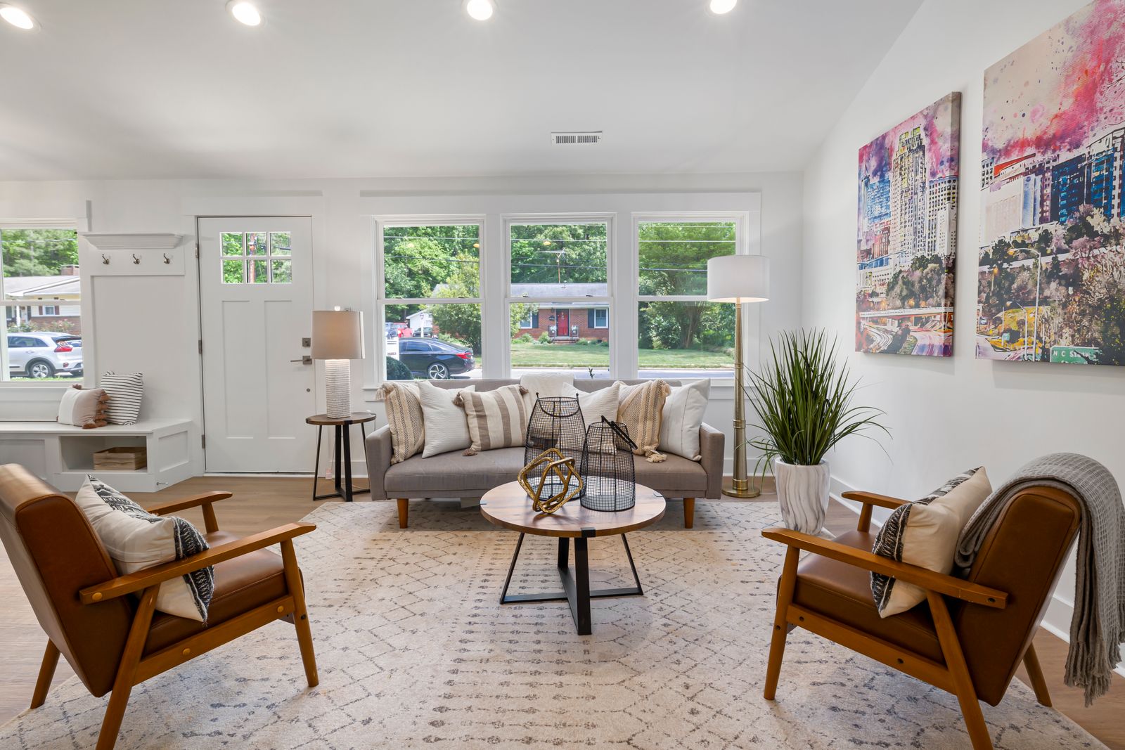 A bright living room with a sofa and comfortable seating